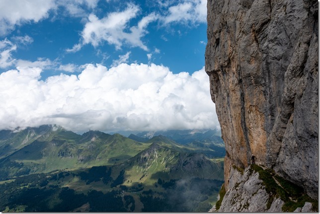 Cris starts the ferrata at the cliffs (Summer road trip August 2024)